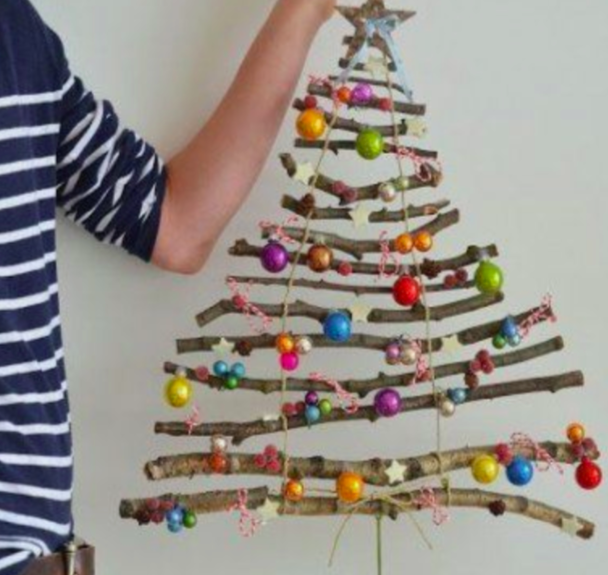 DIY Christmas tree made out of sticks and christmas balls