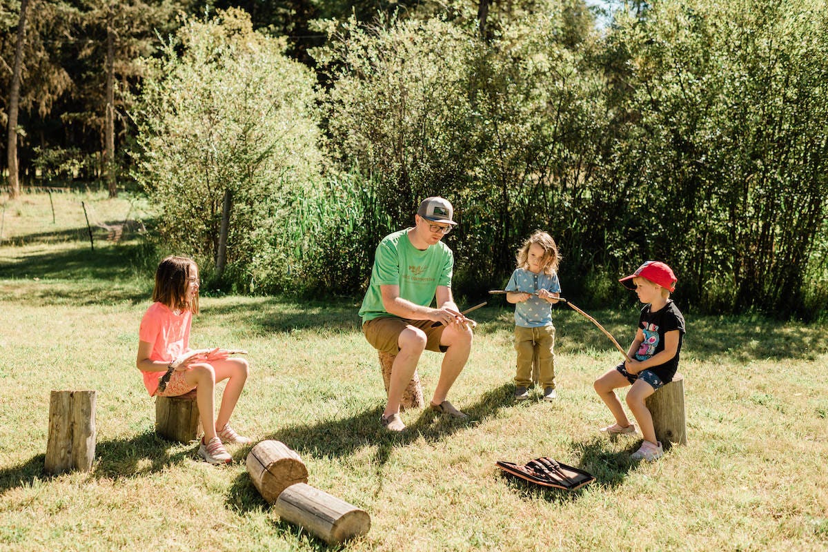 Wild & Immersive Williams lake stick carving in a circle