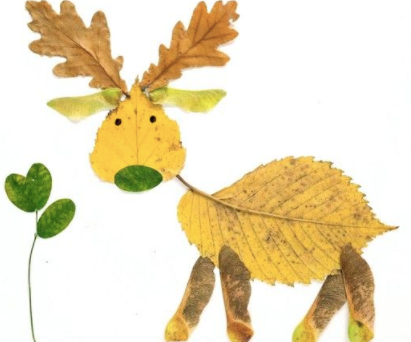 A deer made out of yellow, brown and green leaves