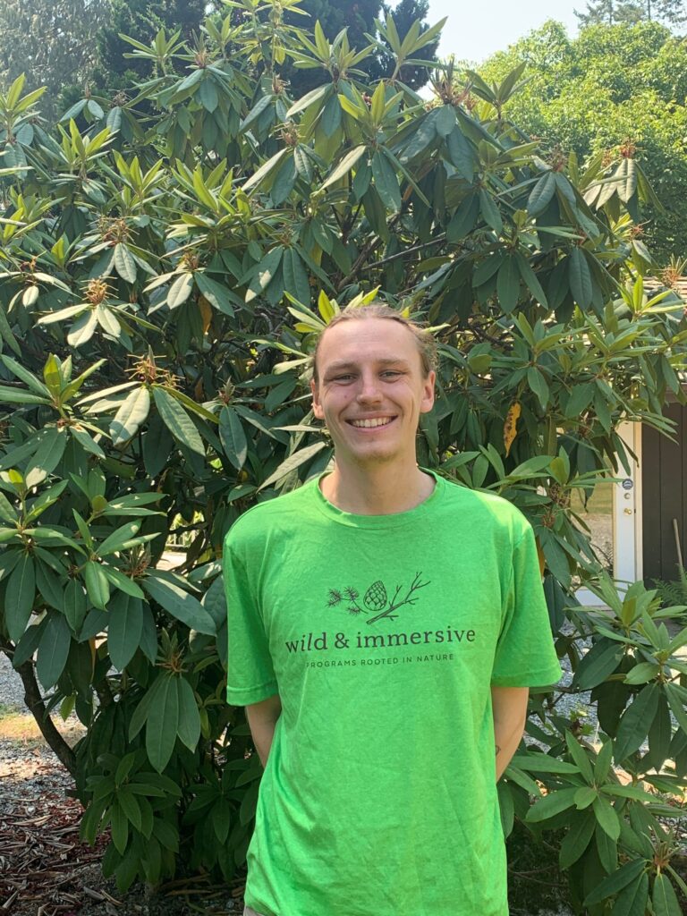 Mitchell Boggs of the Wild and Immersive team wearing a green shirt with company logo